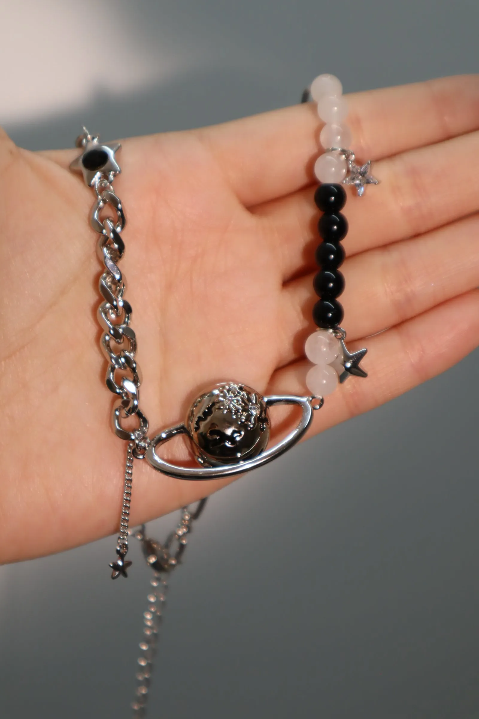 Platinum Plated Black Beads Saturn Star Necklace